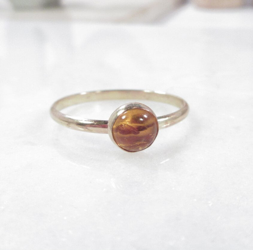 Amber gemstone ring side view