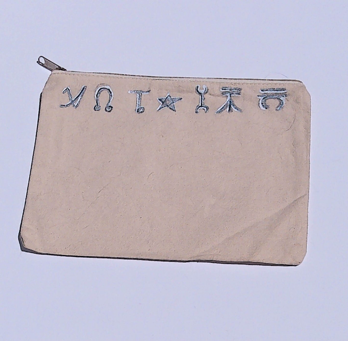 canvas bag in beige with hand painted symbols