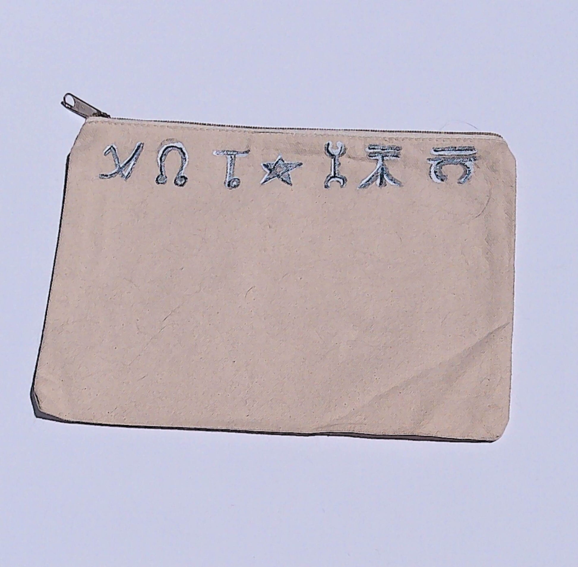 canvas bag in beige with hand painted symbols