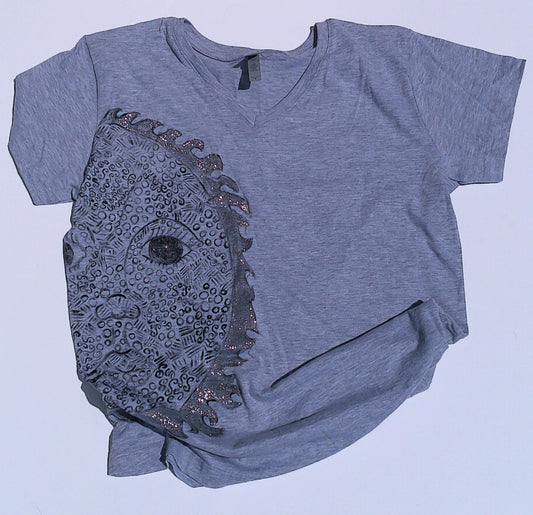 Gray t-shirt with a black sun design on a light blue background