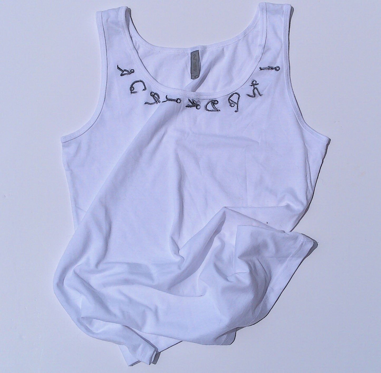 lay down yoga poses tank top on white and a white background