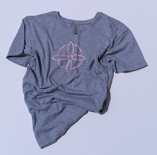 Gray t-shirt with a witches knot design on a light gray background