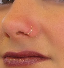 model wearing face hammered nose ring 