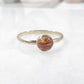 Amber gemstone ring side view