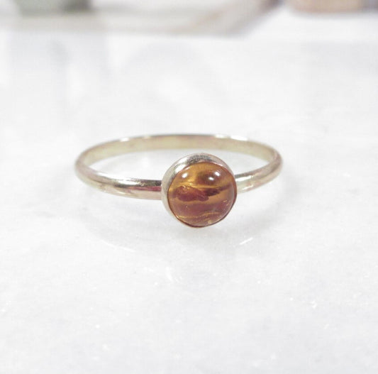 Amber gemstone ring side view