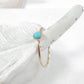 turquoise in yellow gold ring above