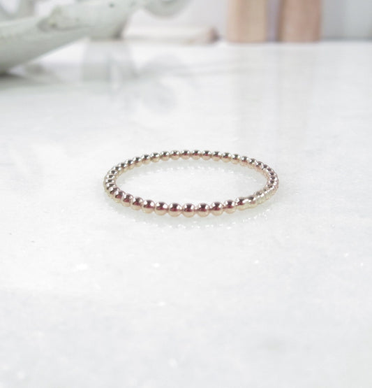 bead ring in gold