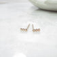 triple dot post earrings in gold