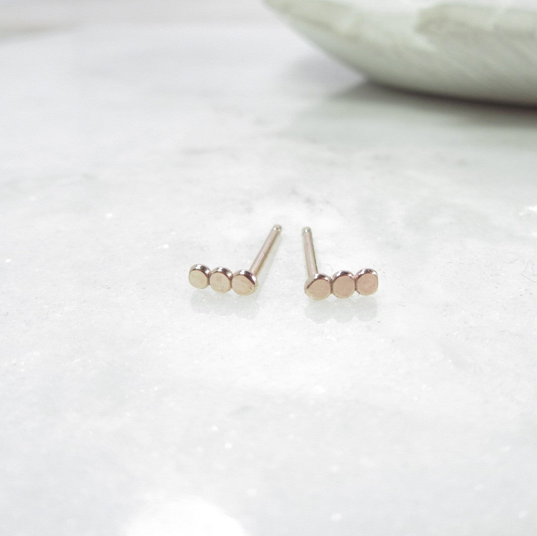 triple dot post earrings in gold