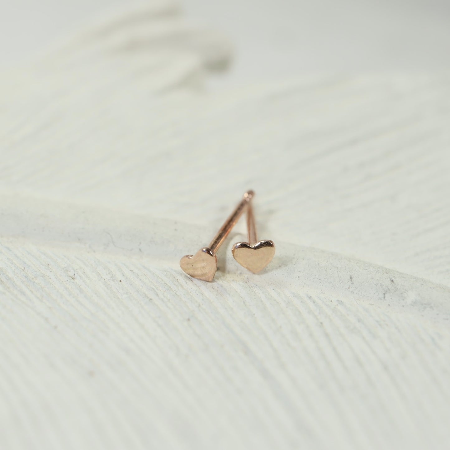 tiny heart post earrings gold