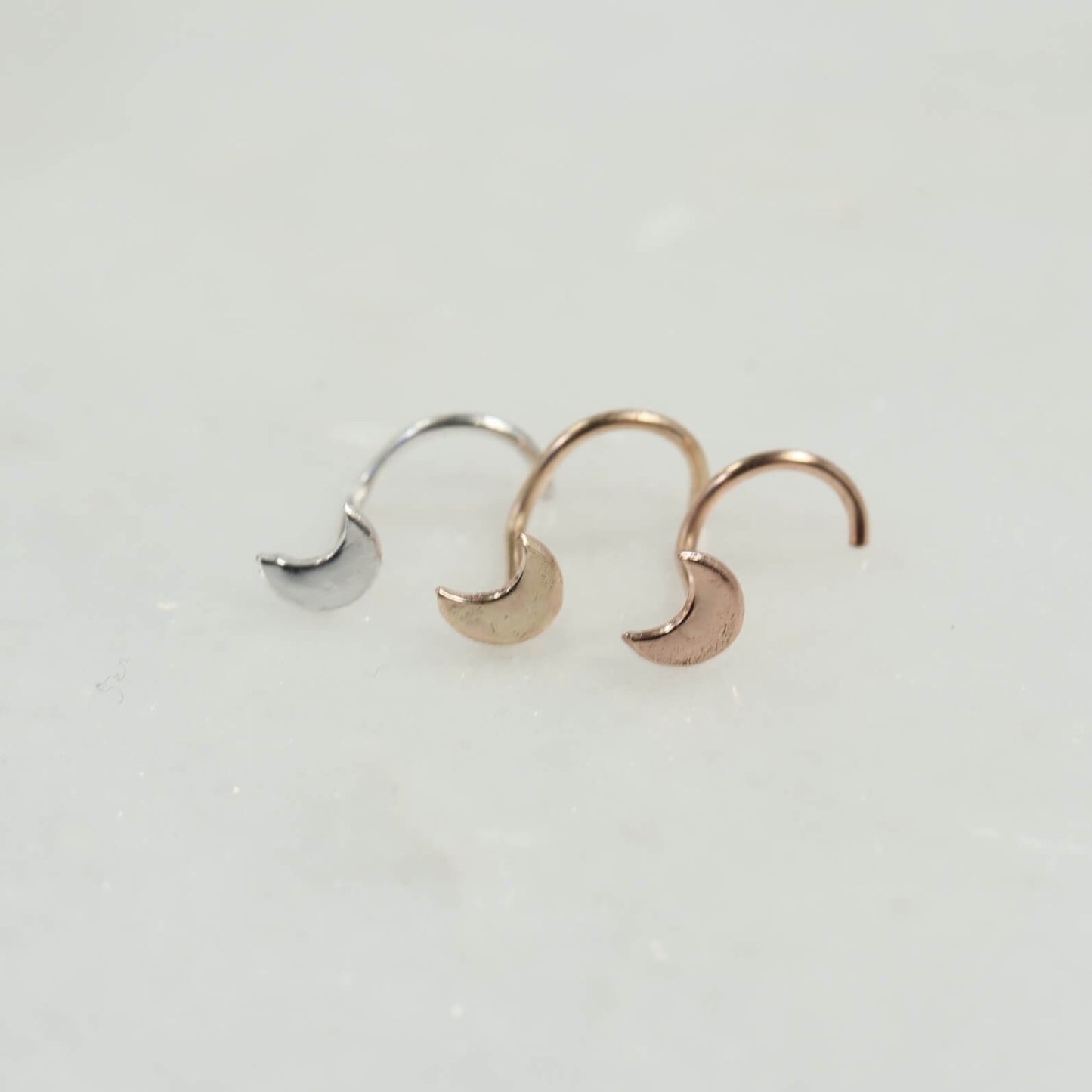 crescent moon nose studs group