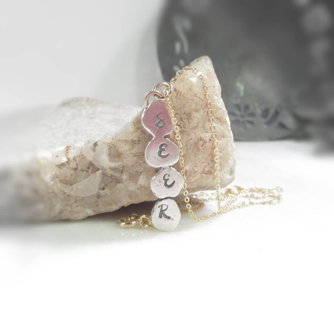 seer necklace on a stone background
