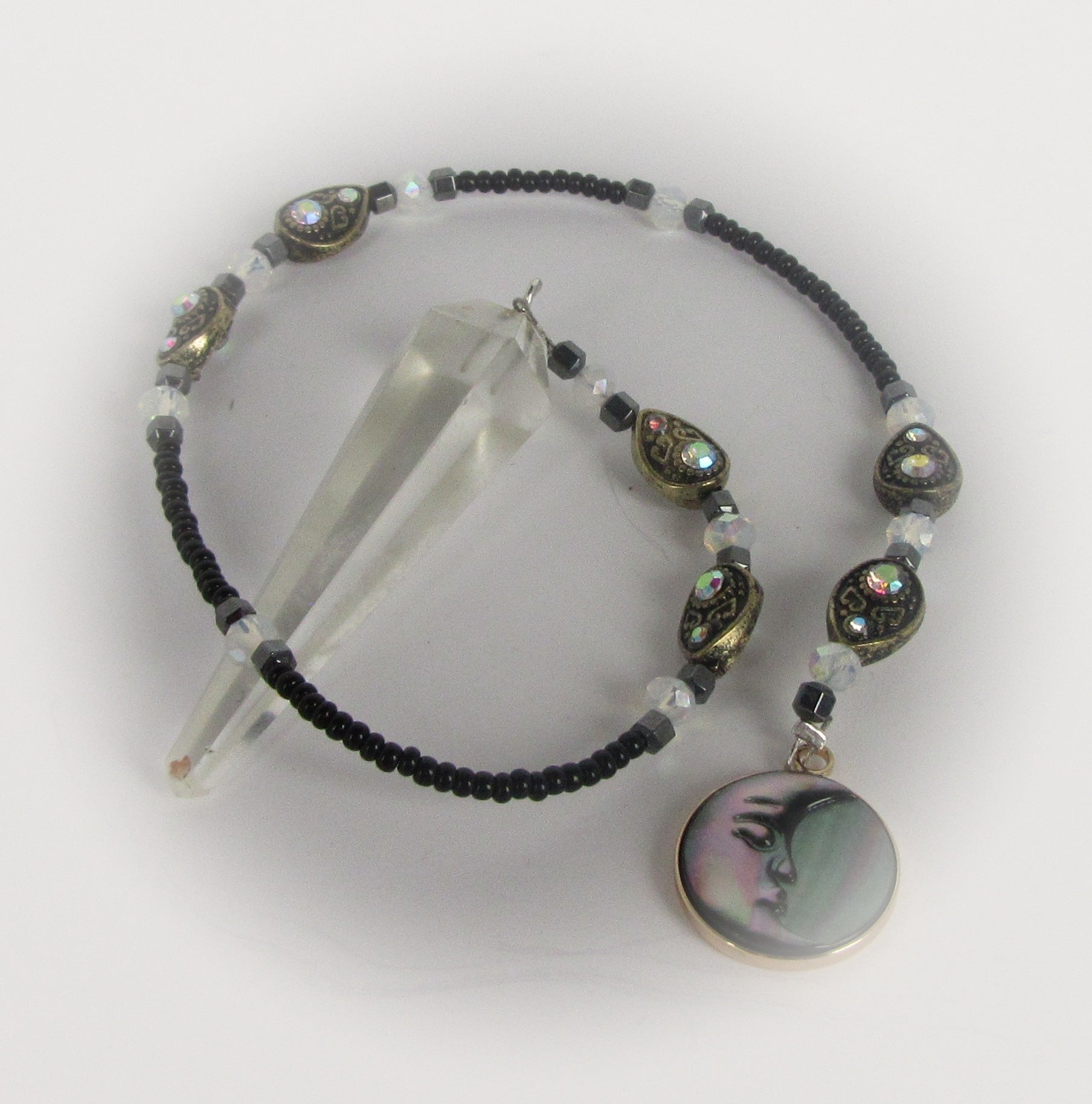 clear quartz pendulum with moon pendant 