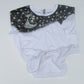 White T shirt with black starry collar on a white background