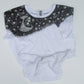 White t shirt with black collar featuring star and moon design on a light gray background