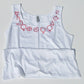 zodiac planets on white tank top and white background