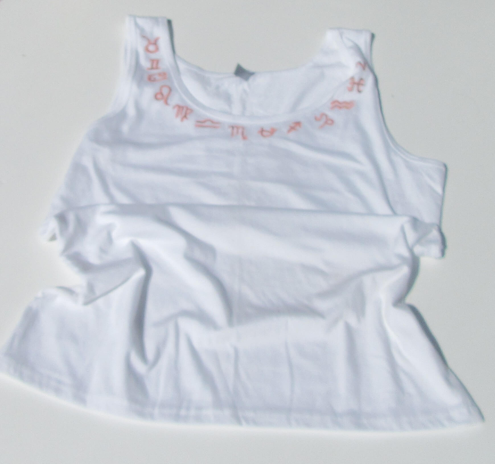 astrology signs on white tank top on a white background