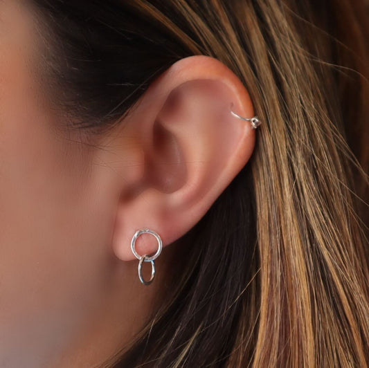 model wearing double circle post earrings