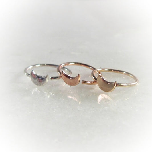 3 crescent moon hoops on a white background. 