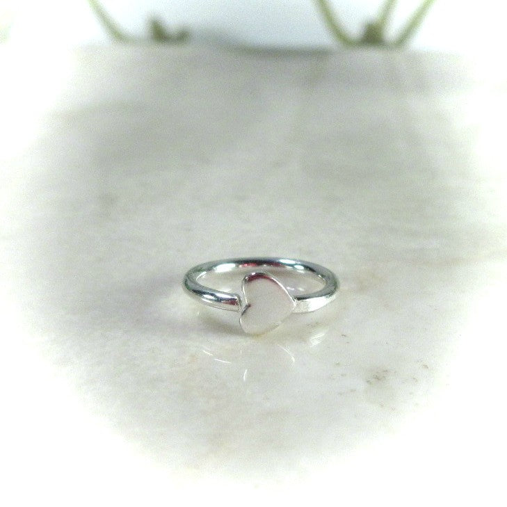 side view tiny heart tragus hoop