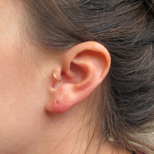 face hammered tragus on model 